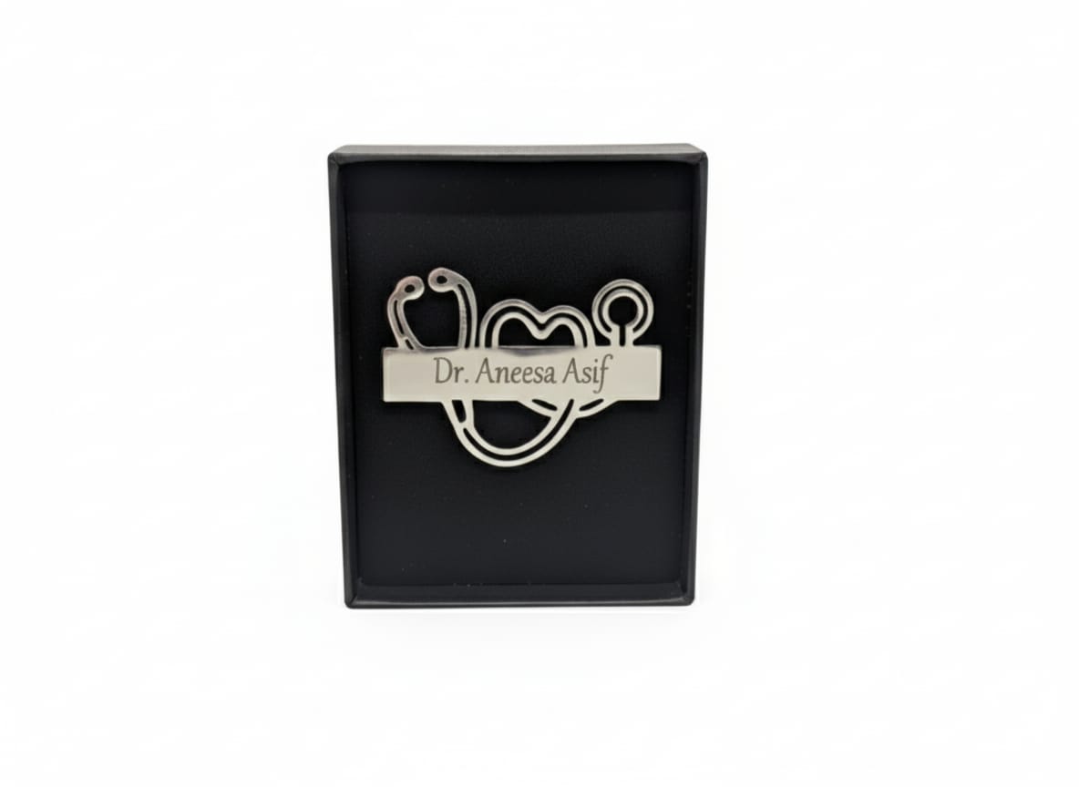 Stethoscope-shaped nameplate with name text in a black box on a white background