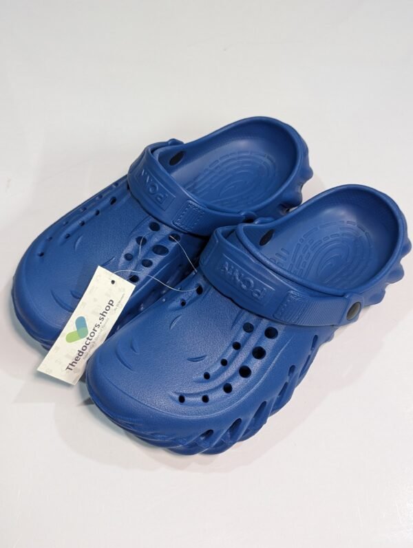Pair of beige PGM medical clogs with ventilation holes and adjustable heel strap, displayed with TheDoctors.shop tag